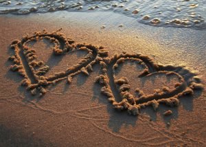 2 hearts in the sand two hearts drawn in the sand